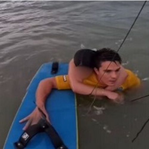 OLYMPIC KITE SURFER SAVES DROWNING SWIMMER
