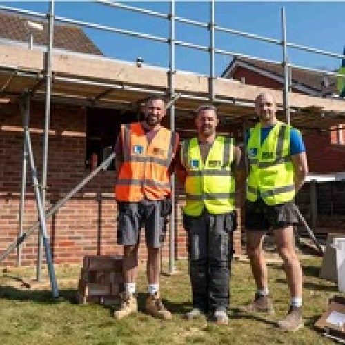 VOLUNTEERS BUILD LIFE-CHANGING EXTENSION FOR DISABLED MAN IN SURREY
